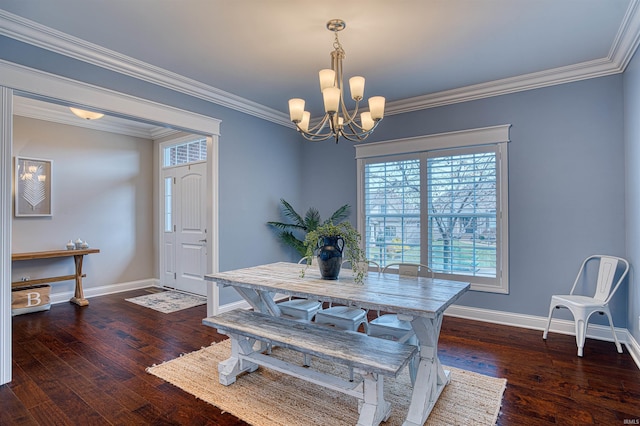 dining room featuring a notable chandelier, dark hardwood / wood-style flooring, and crown molding