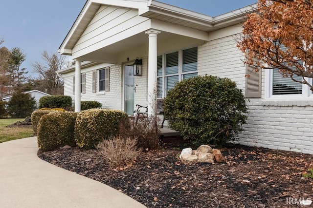 entrance to property with a porch