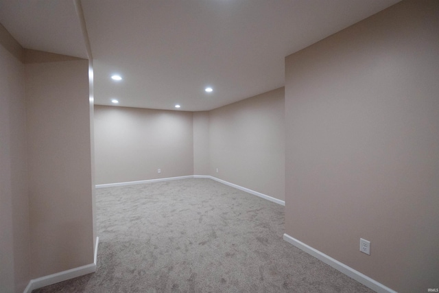 spare room with light carpet