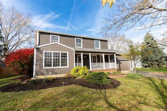 view of front of house with covered porch and a front yard