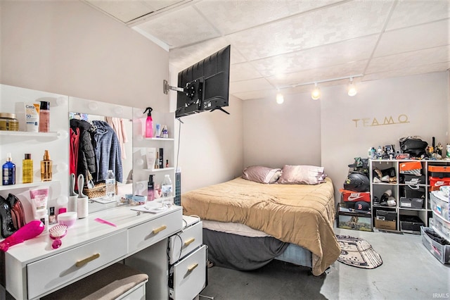 bedroom with concrete floors