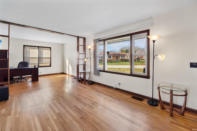 home office featuring light wood-type flooring