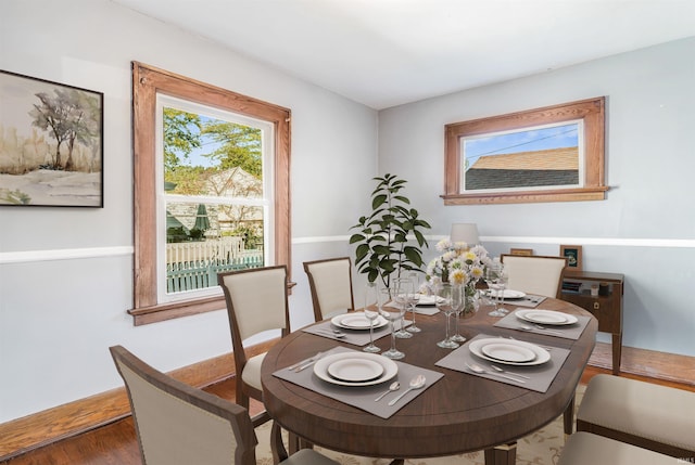 dining area featuring hardwood / wood-style floors