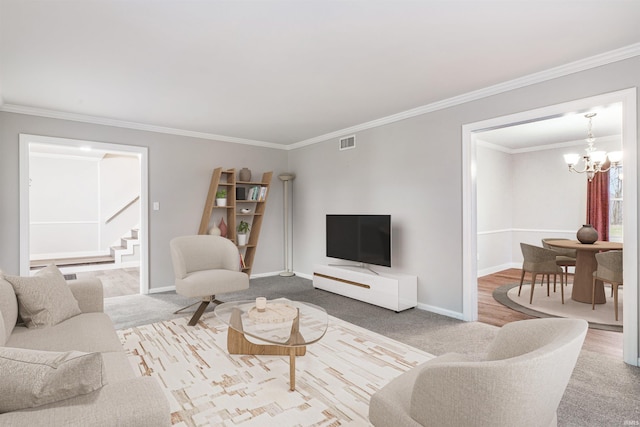 living room with a chandelier, carpet, and crown molding