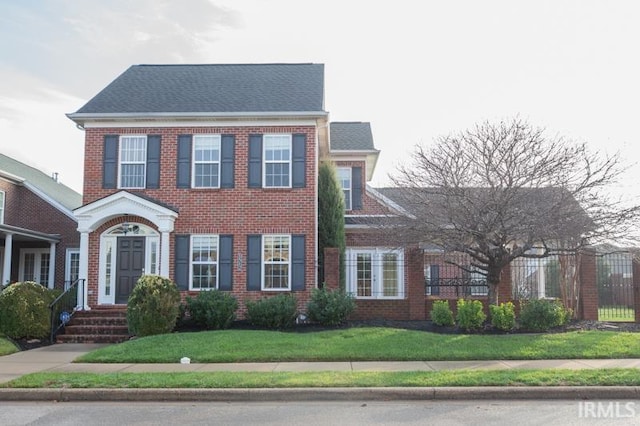 colonial house with a front lawn