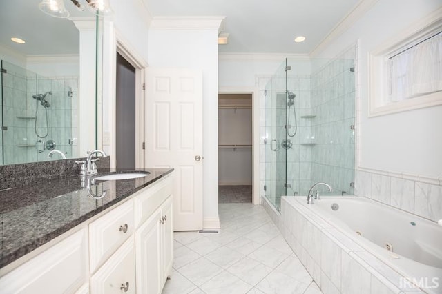 bathroom featuring plus walk in shower, vanity, ornamental molding, and tile patterned flooring