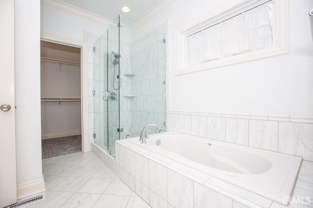 bathroom featuring separate shower and tub and ornamental molding