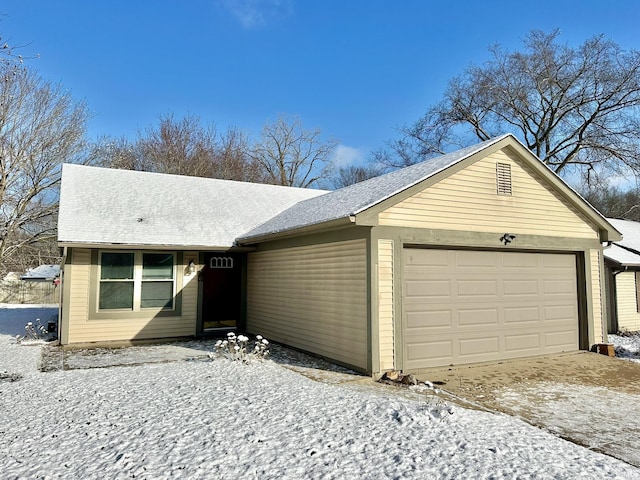 single story home with a garage