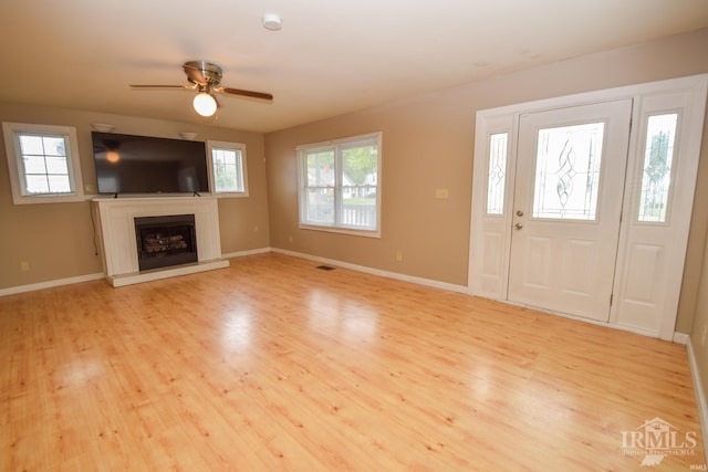 entrance foyer with light wood-type flooring and ceiling fan