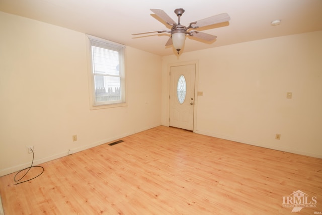 entryway featuring ceiling fan and light hardwood / wood-style floors