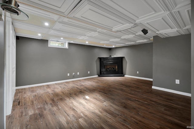 unfurnished living room with dark hardwood / wood-style flooring