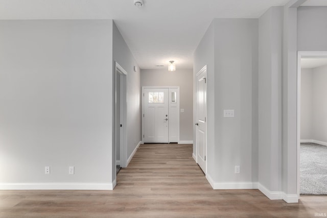 entrance foyer featuring light hardwood / wood-style floors