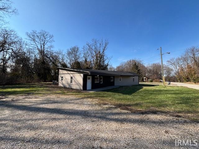 exterior space with a yard