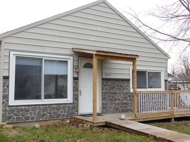 exterior space featuring a wooden deck