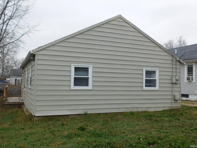 view of property exterior featuring a yard