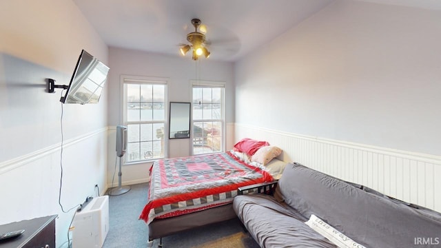 bedroom featuring carpet and ceiling fan