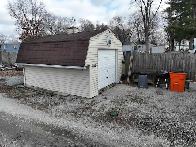 view of outbuilding with a garage