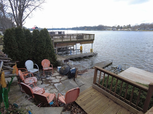 dock area with a water view