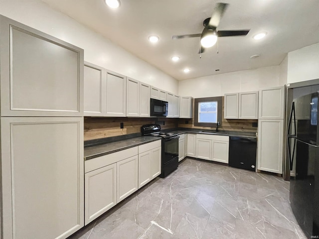 kitchen with black appliances, ceiling fan, sink, and tasteful backsplash