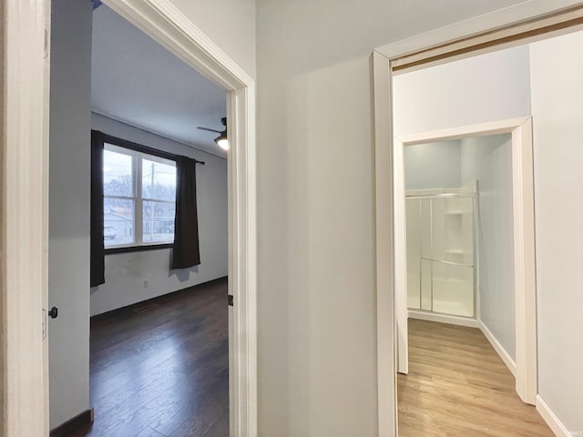 hallway featuring hardwood / wood-style floors