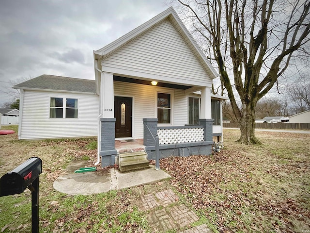 view of front of home featuring covered porch