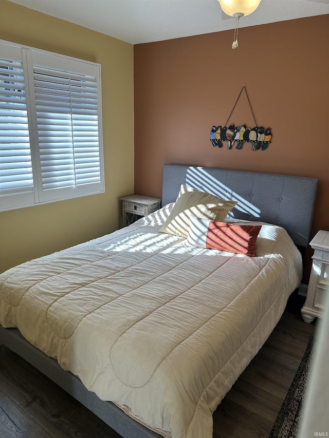 bedroom featuring wood-type flooring