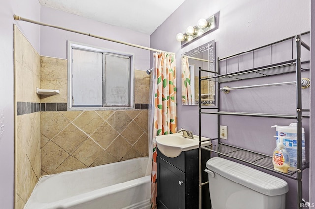 full bathroom with toilet, vanity, and shower / tub combo with curtain