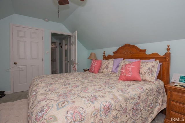 bedroom with vaulted ceiling, ceiling fan, and light colored carpet