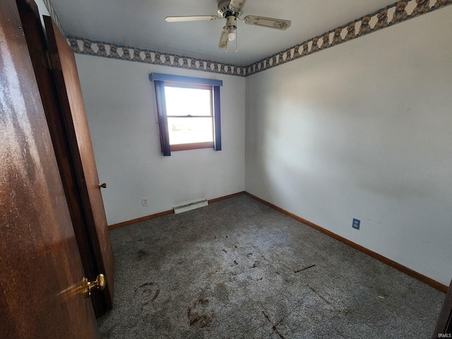 unfurnished room with ceiling fan and carpet floors