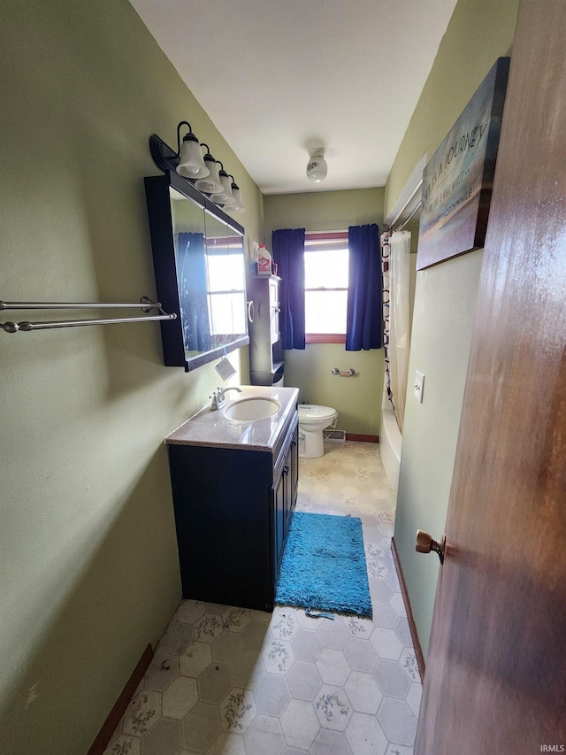 full bathroom with vanity, toilet, and shower / bathtub combination with curtain