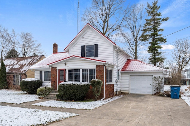 view of front of property with a garage