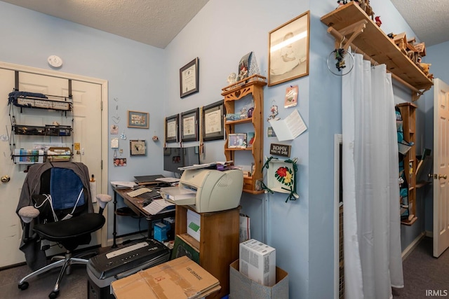 office space with a textured ceiling