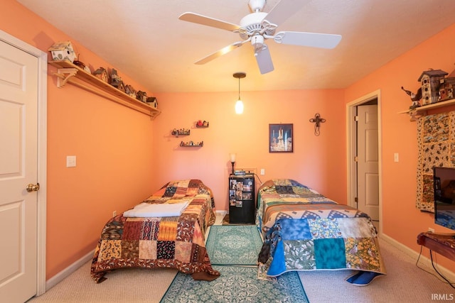 bedroom featuring carpet and ceiling fan