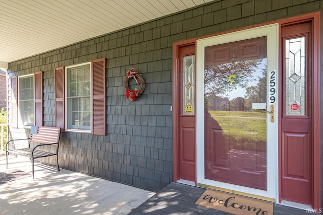 property entrance with a porch