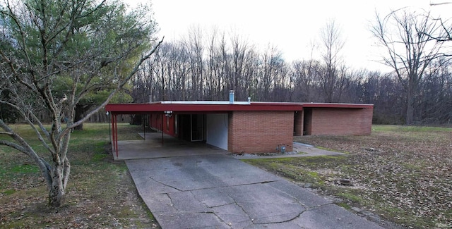 view of front of house with a carport