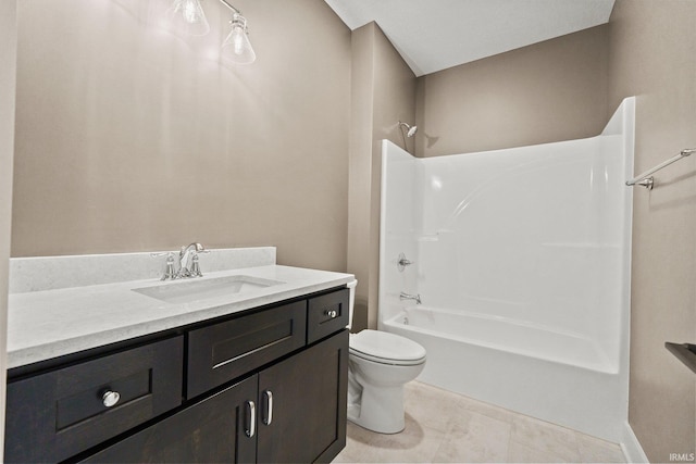 full bathroom featuring bathtub / shower combination, vanity, and toilet