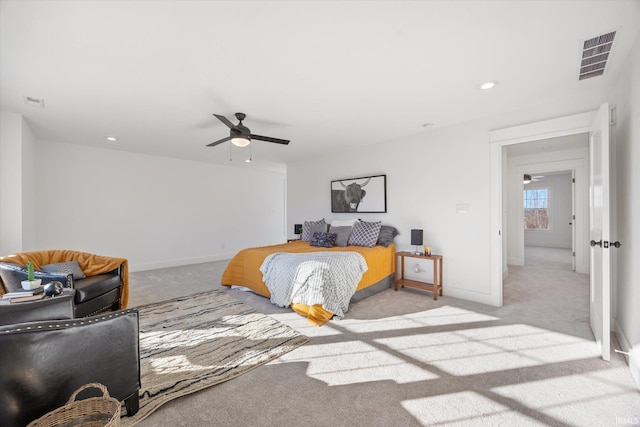 carpeted bedroom with ceiling fan