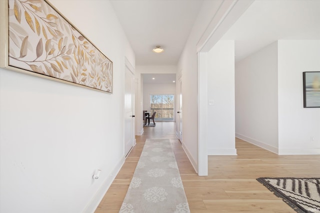 hall featuring light hardwood / wood-style flooring