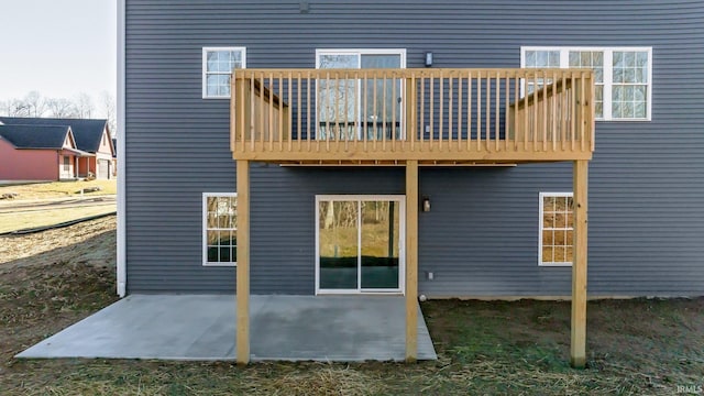 back of property with a patio