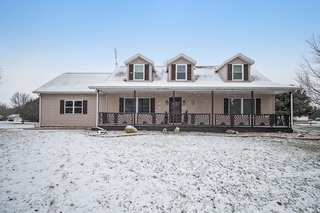 cape cod home with covered porch