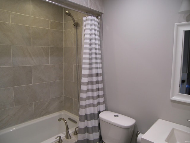 full bathroom featuring toilet, shower / bathtub combination with curtain, and sink