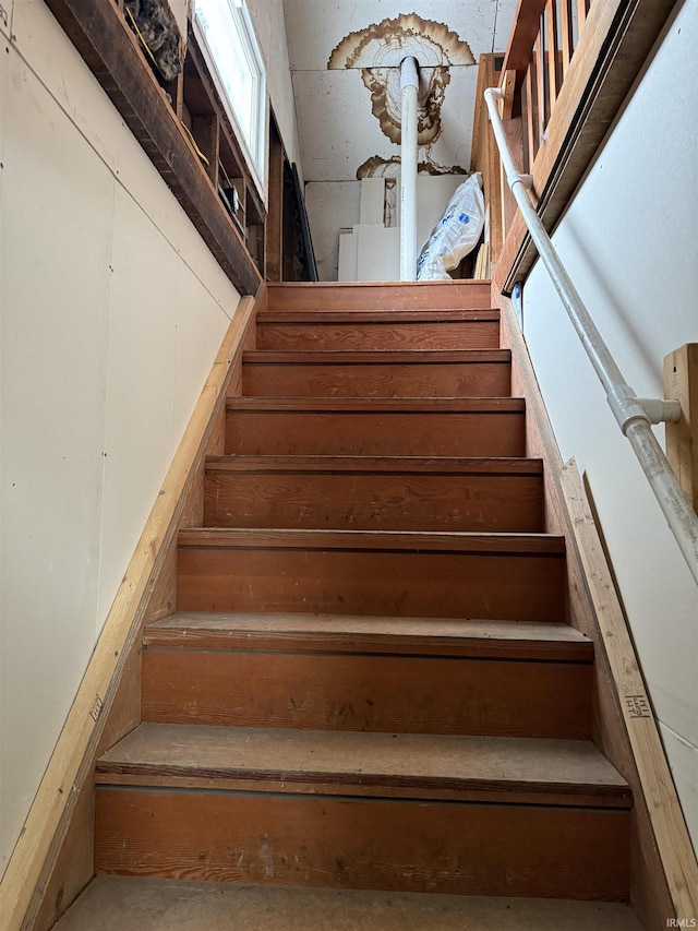 stairs with concrete floors