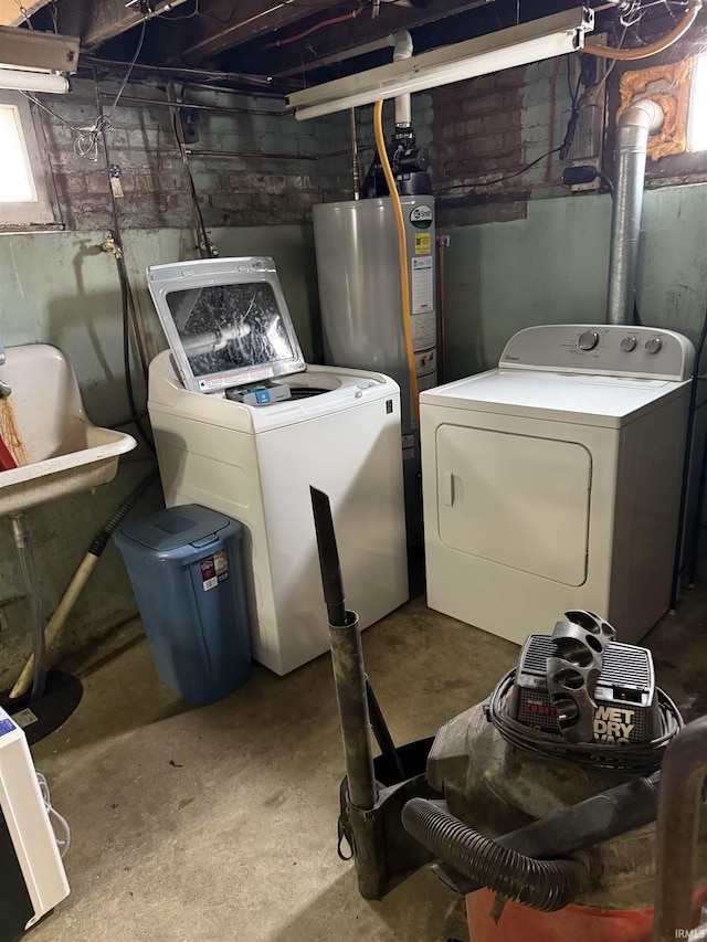 laundry area featuring washer and dryer and gas water heater