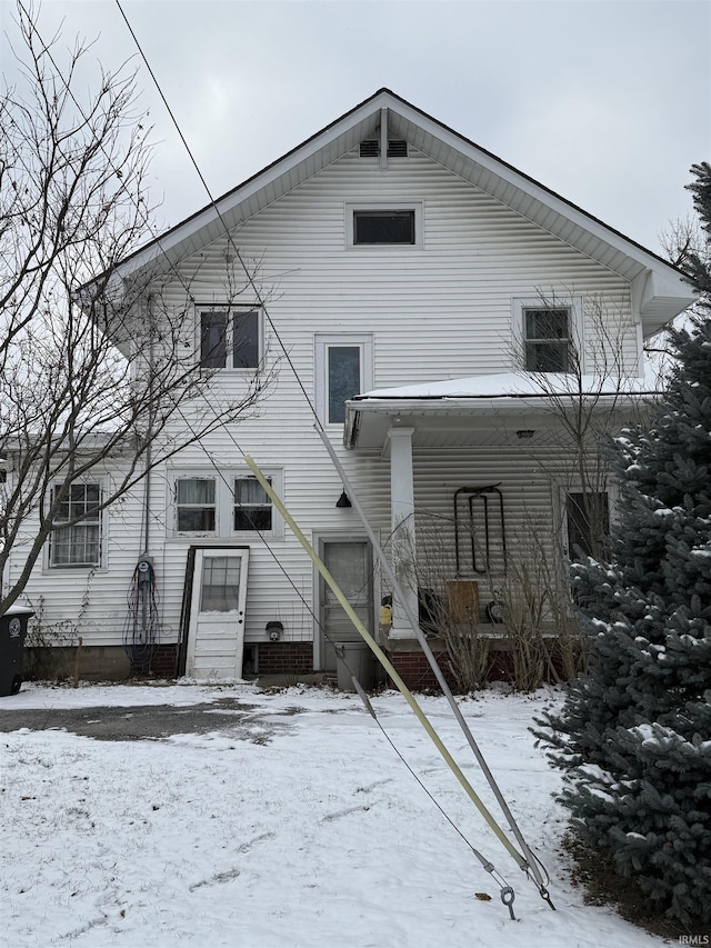 view of snow covered property