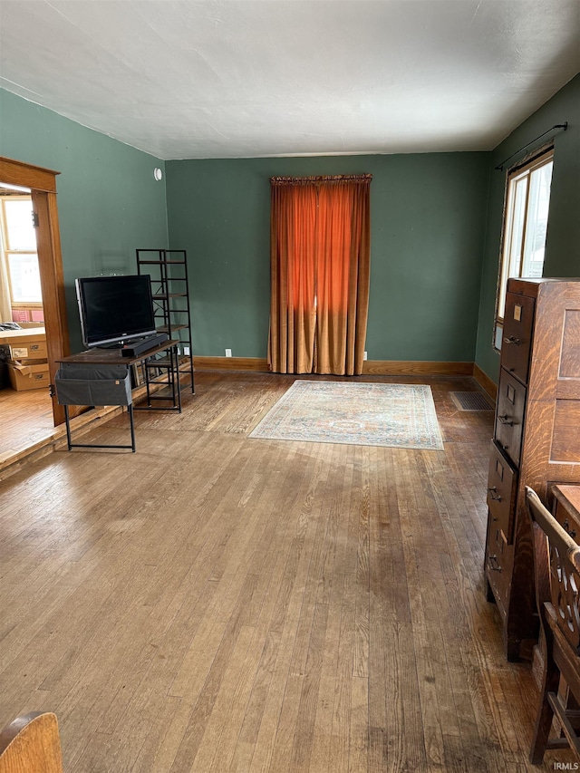 living room with hardwood / wood-style flooring