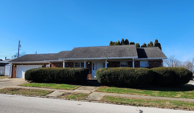 ranch-style house featuring a garage