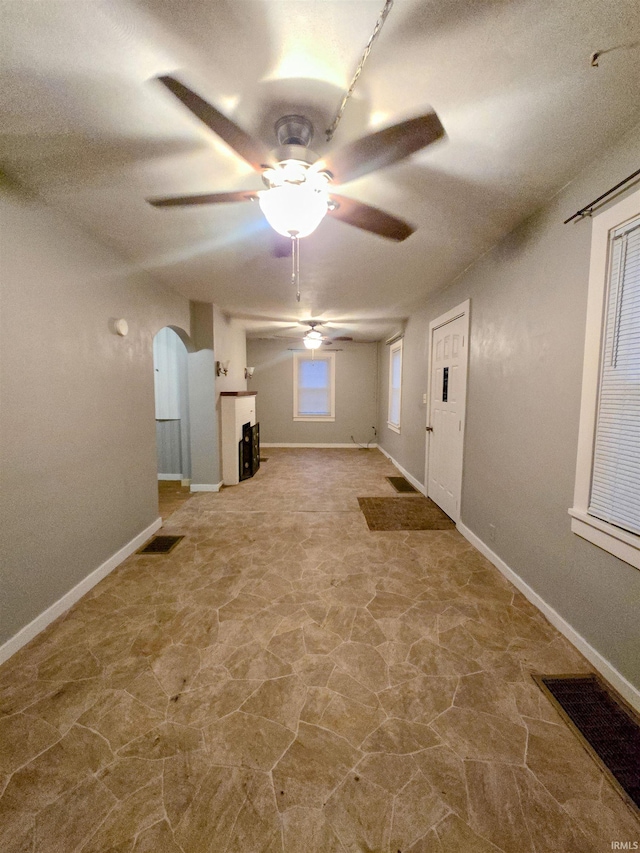 basement with ceiling fan