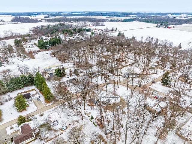 snowy aerial view with a rural view