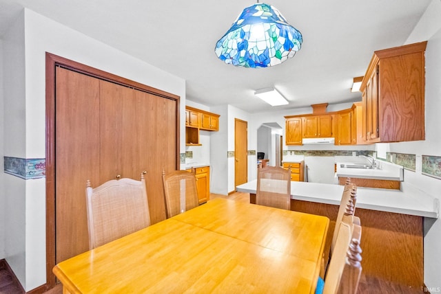 dining space featuring sink