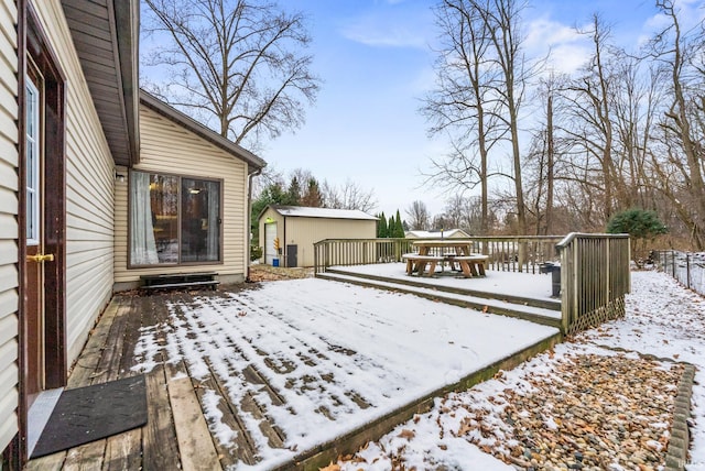 view of snow covered deck